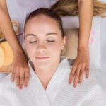 Tranquil spa treatment room with natural exfoliating scrubs and aromatic oils